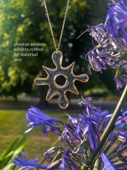 Pendentif Adinkra en or